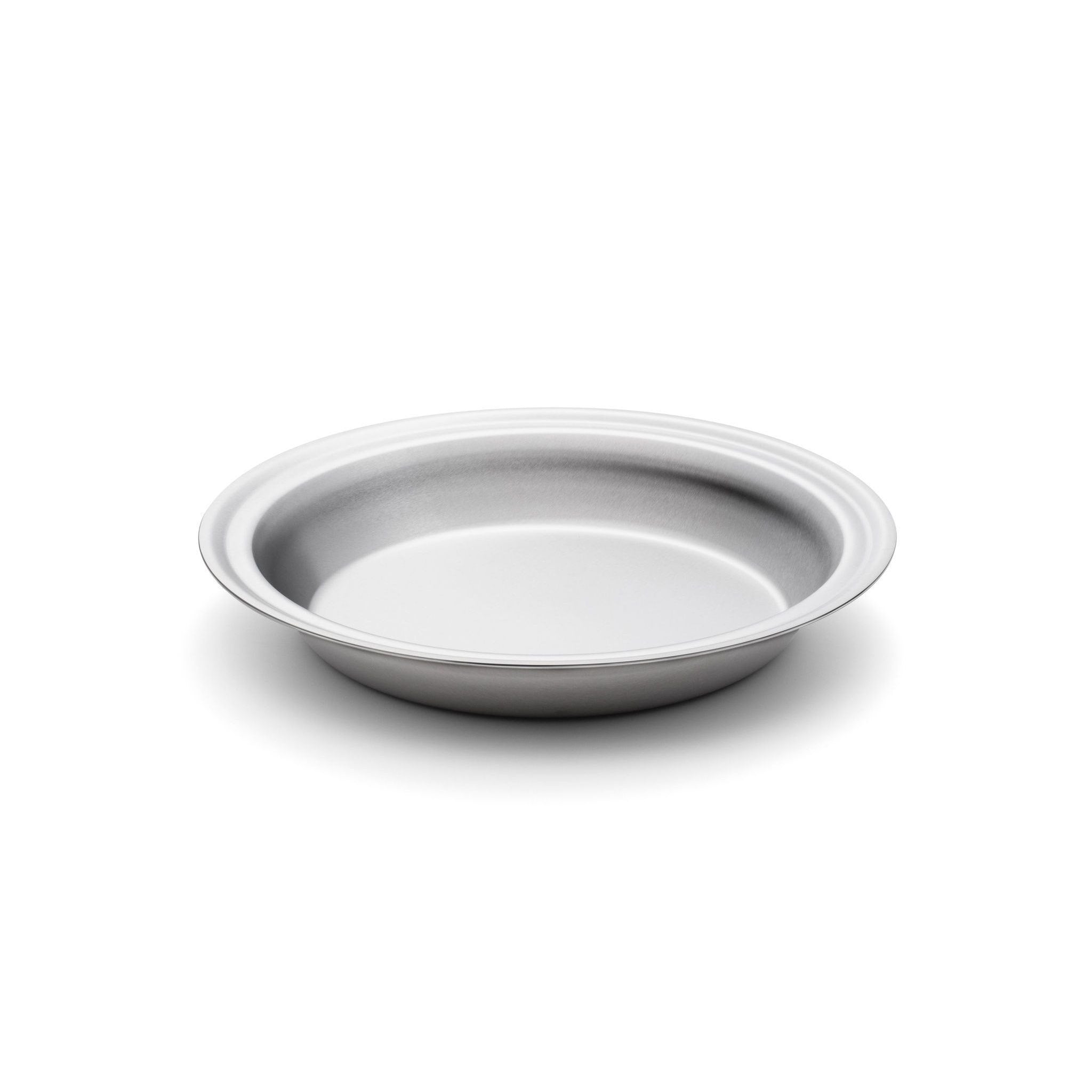 round shallow white plate on a white background