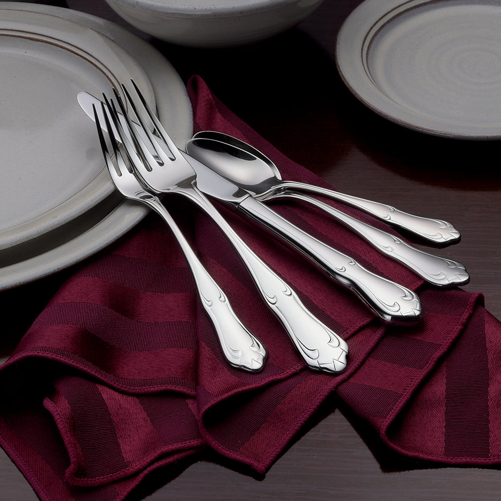 Champlin- 45 Piece Set displayed with utensils on a table setting