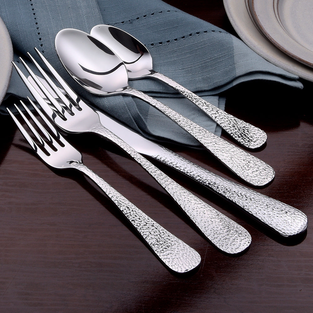 Providence- 45 Piece Set featuring hammered stainless steel utensils including forks, spoons, and knives.