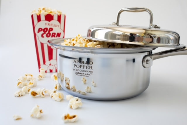 Apollo Popper by 360cookwares with popped corn and popcorn box in background